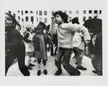 Children dancing on the covered fountain in Westbeth Park, Westbeth Artist Housing, New York City, USA