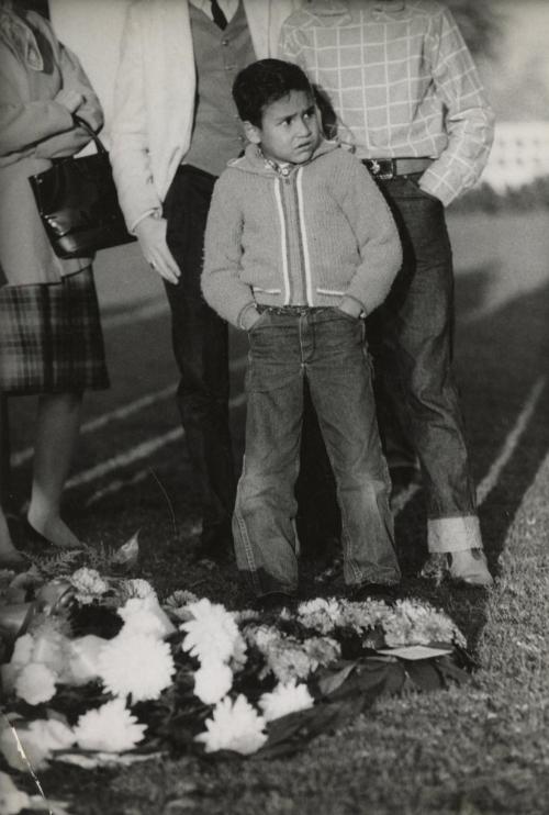 Sad boy with hands in pocket, Kennedy funeral memorial