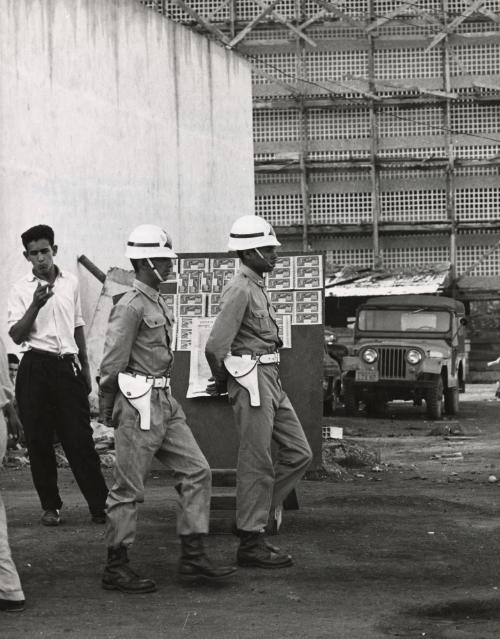 Builders and doctors in Brasilia: Brasilia, the most modern capital city in the world has 65,000 inhabitants in 1959. Today, its population totals 250,000. In three years, this figure will increase to 500,000. Since the first foundations were laid, builders and doctors have worked closely together, first to see to it that the 60,000 workers who took part in building the new city stayed in good health; then to prevent the town from being invaded by diseases of the bush and forest. Immigrants' health are checked systematically on the roads in order to discover possible sources of dangerous disease.