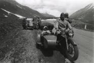 Family on motorcycle with sidecar
