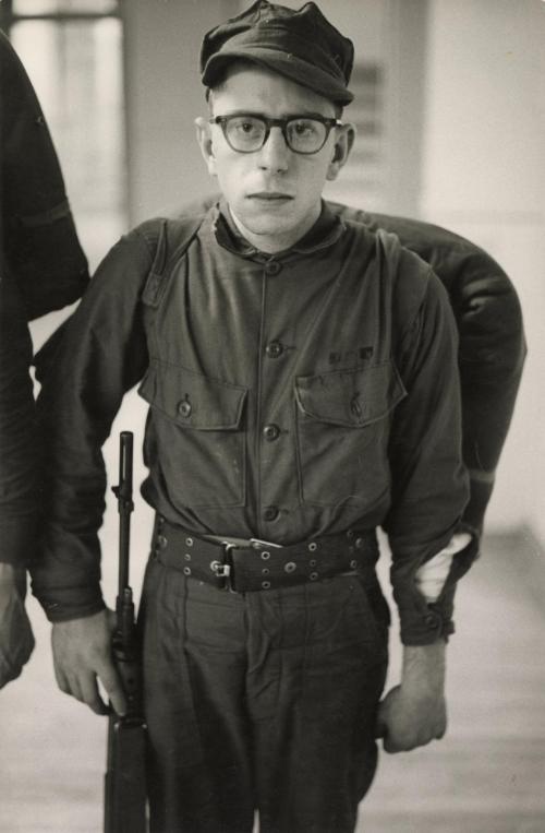 Portrait of United States Marine Corps recruit wearing glasses