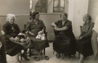 Gypsy women sitting together, Saintes Maries de la Mer, France