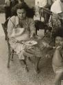 Gypsy woman breastfeeding her child, Saintes Maries de la Mer, France