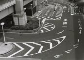 Road Curving into Building Parking Lot, Japan