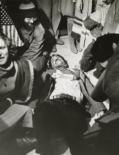 Hoffman with Protesters: Activist Abbie Hoffman is shown on the ground at the Bicks County Courthouse in Doylestown, Pennsylvania on Monday. They are dramatizing opposition to the Point Pleasant water diversion project