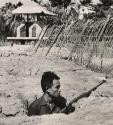 Home Defense Specialist is this member of South Vietnams Popular Forces, a group that fights only in defense of their hamlet or village. Earthen works is five feet high and five feet thick and ringed by seven mined moats and thick barbed wire, 1965