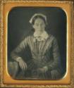 Portrait of a Woman Holding a Daguerreotype