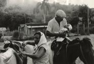 Man on horse carrying baby, Sierra Maestra, Cuba