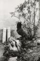 Study of garden with a statue of a girl and wooden pot