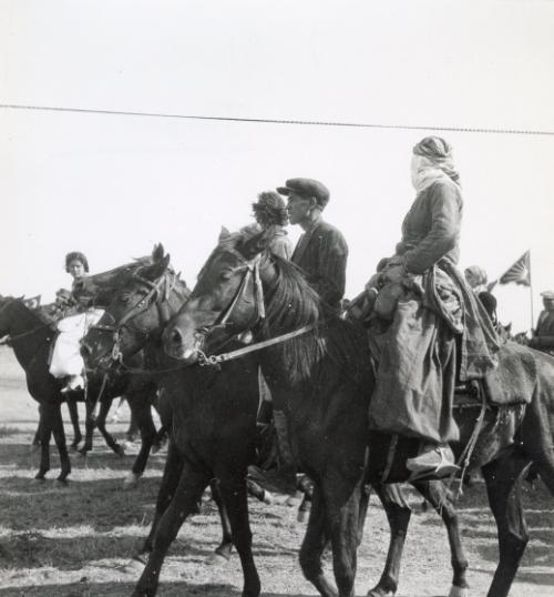 Anatolian peasants on horseback prepare to parade in front of the stadium, Ankara, Turkey