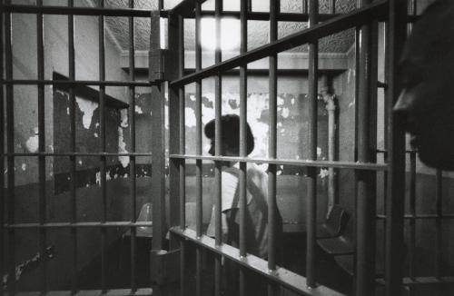 Inmate inside holding cell, 9th police precinct, NYC