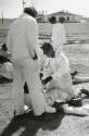 Prisoners working in the Cummins Unit or farm area of the Arkansas State Penitentiary fighting, Cummins, Arkansas