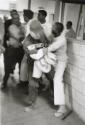 Using my presence, a prisoner tries to start some disturbance. He is subdued by a guard in the Cummins unit of Arkansas State Penitentiary, Cummins, Arkansas