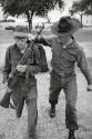 United States Marine Corp boot camp: the climax of a hellish day for this man from the Motivation platoon. He has made it through the day with all its forced marches, exercises, and infiltration course, but is now being led (and orally humiliated at the same time) to a resident psychologist for examination