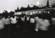 Busy crowd with shuttle train in background, Caucasus region