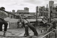 A construction site becomes a playground for these teenagers playing truant from school, Manchester, England,