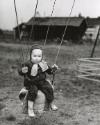 Toddler on swing