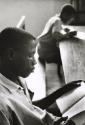 Boy reading, Ghana