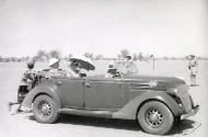The Governor and Mrs. Ingleson drive General De Gaulle to the parade for inspection of the Free French Forces, El Fasher, Sudan