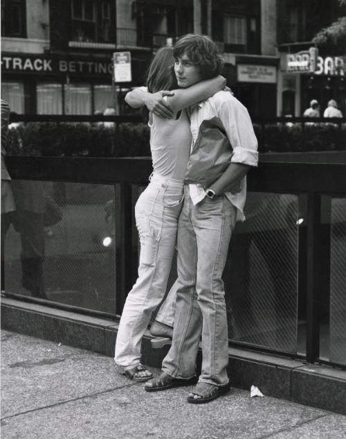 Young Couple Embracing, Times Square, NYC