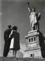 Couple at the Foot of Statue of Liberty, New York