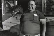 Groom in the Backstretch, Great Barrington Fair, Great Barrington, MA, from the series "Racing Days"