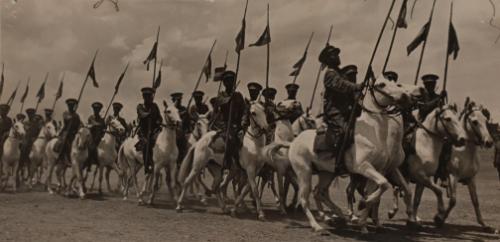 Abyssinian soldiers on horseback with flags, second Italo-Abyssinian War, Ethiopia