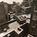 View from a Gold Street rooftop looking east toward the rear of Fulton Street, from the series "The Destruction of Lower Manhattan"
