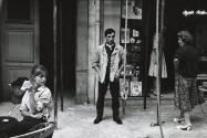 Street scene with man and two women, Paris, France