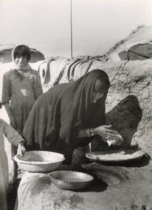 Peasant preparing bread, Bagdad, Iraq