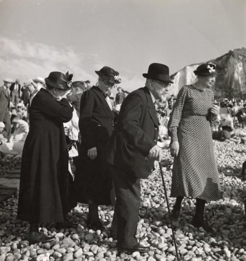 Treport: Atlantic beach resort near Paris: Crowds of clerks, stenographers, shop girls, families of modest means stream to Treport every Sunday. Trains leave Paris early in the morning and bring them back late at night, happy and tired after a day spent on the beach, Treport, France