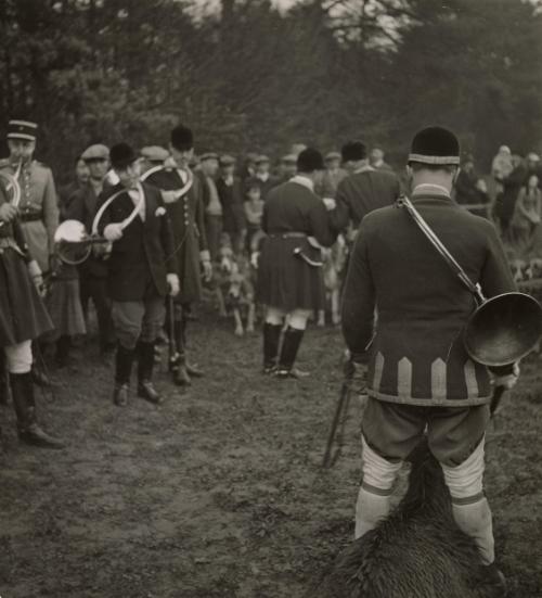 Stag Hunt in Ermenonville Forest, France: Horns are sounded to summon stray hunters. The dead stag (foreground) is kept well without the reach of the dogs.