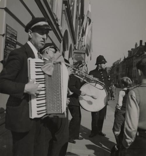 Christening of the Heiress to Holland's Throne (Beatrix Armgard): The loyal subjects of the Royal House of Orange, aristocrats and commoners, rich and poor, old and young, whole-heartedly took part in the joyful celebrations on the occasion of the christening of Princess Beatrix, infant daughter of Princess Juliana and Prince Bernard. With touching affection and devotion, the whole county rejoiced in the happiness of its beloved Royal family. A brilliant pageant was staged to honor the heiress presumptive to the Dutch throne. All the notables and dignitaries of the country, Royal guests from abroad, including King Leopold of the Belgians joined the splendid procession to the great church of the Hague where the religious ceremony took place. The infant princess' godparents were King Leopold of the Belgians, Duke Adolph Frederick of Mecklen