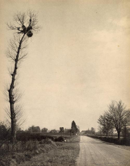 La Route a l'entrée du village (The road at the entrance of the village).
