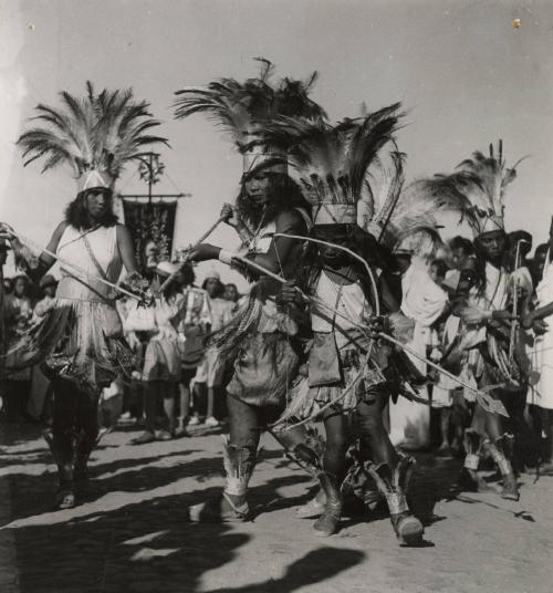 The dancers of the Catholic procession always wear headresses while doing the sacred dance, Carnival, Brazil