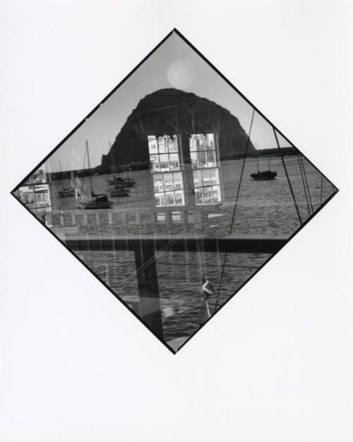 Morro Rock (waterfront window reflection)