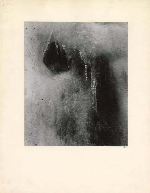 Shrouded Figure in Ice