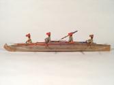 Model of a Bidarka boat with four seated figures