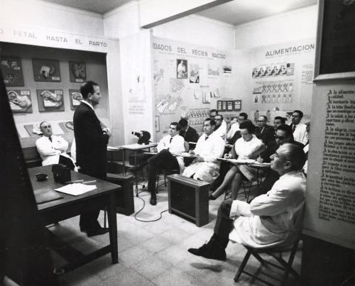 Builders and doctors in Brasilia: Brasilia, the most modern capital city in the world has 65,000 inhabitants in 1959. Today, its population totals 250,000. In three years, this figure will increase to 500,000. Since the first foundations were laid, builders and doctors have worked closely together, first to see to it that the 60,000 workers who took part in building the new city stayed in good health; then to prevent the town from being invaded by diseases of the bush and forest. Immigrants' health are checked systematically on the roads in order to discover possible sources of dangerous disease.