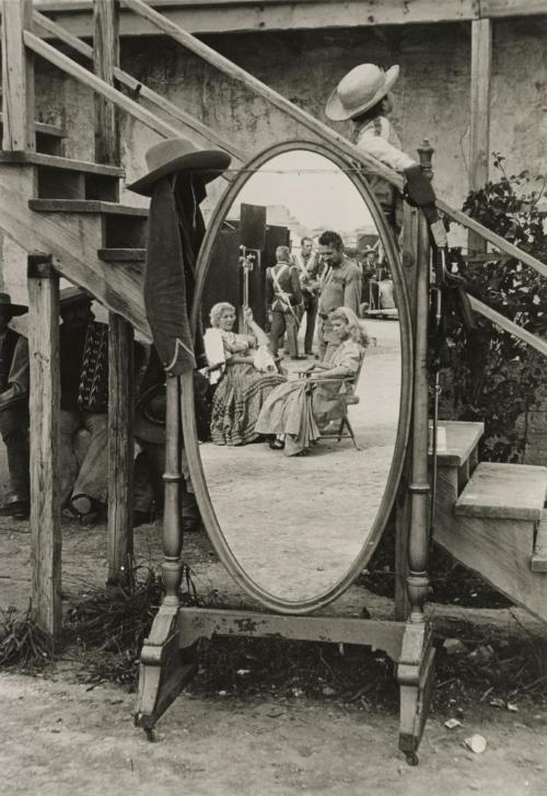 Actors resting during the filming of "The Alamo"