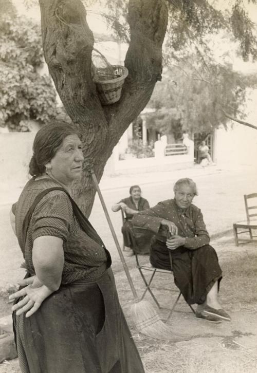 Gypsy women resting under a tree, Saintes Maries de la Mer, France