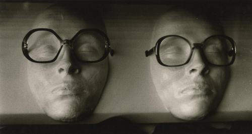 Clay faces wearing glasses, Japan