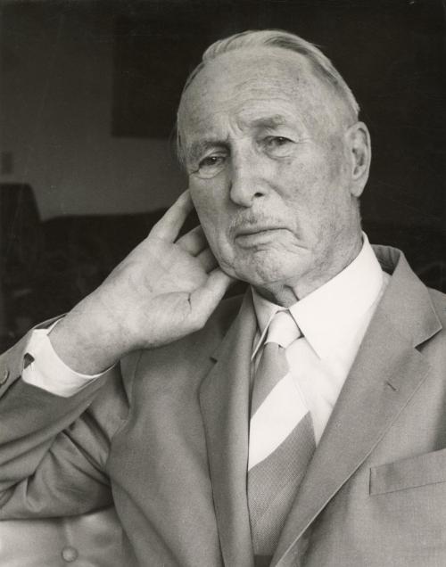 Portrait of Swiss doctor Paul Niehans, who developed cellular therapy, resting head on hand