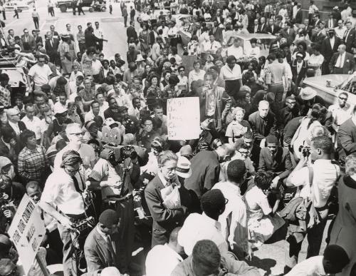 Crowd of demonstrators kneel in prayer outside city hall after march from Soldier Field in protest to alleged school segregation in Chicago. March took place two-day (of) school boycott when court order blocked it