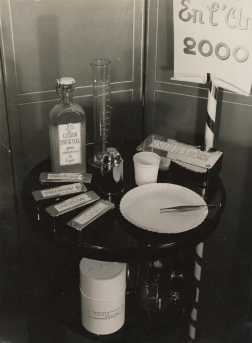 Still life with biscuits, synthetic lemon juice, and nutritional supplements