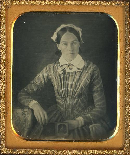 Portrait of a Woman Holding a Daguerreotype