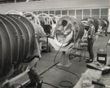 Scientist in pods at McDonnell Aircraft Corporation working for NASA's second human spaceflight program, Project Gemini, St. Louis, Missouri