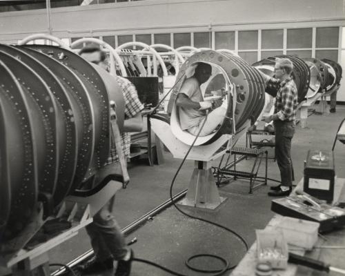 Scientist in pods at McDonnell Aircraft Corporation working for NASA's second human spaceflight program, Project Gemini, St. Louis, Missouri