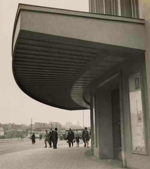Gare de Caen: exterior of station with men and boys, France