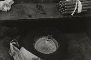 Making cigars: bundle of cigars with hat, Cuba